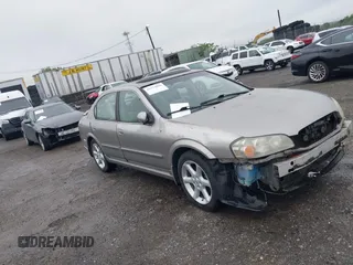 2002 Nissan Maxima GXE z VIN JN1DA31D32T437223, wystawiony jako IAAI lot #42274090 z przebiegiem 111 791 mil mil oraz . Historia ofert i sprzedaży dostępna na DreamBid. Obrazek 1.
