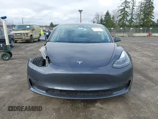 2023 Tesla Model 3 with VIN 5YJ3E1EA2PF623217, listed as a IAAI auction lot 41701413 with 21,246 mi miles and . Bid and sale history available at DreamBid. Image 13.
