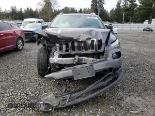 2014 Jeep Cherokee Altitude with VIN 1C4PJMCB1EW241229, listed as a Copart auction lot 84825234 with 179,361 mi miles and Salvage Title. Bid and sale history available at carsss.com. Image 5.