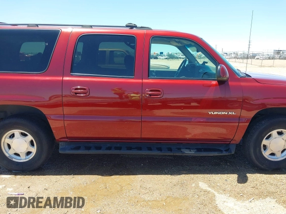 2003 GMC Yukon XL SLT z VIN 1GKEC16Z63J166423, wystawiony jako IAAI lot #42330690 z przebiegiem 190 589 mil mil oraz . Historia ofert i sprzedaży dostępna na DreamBid. Obrazek 13.