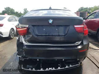 2013 BMW X6 M with VIN 5YMGZ0C50D0C40144, listed as a Copart auction lot 64889554 with 91,024 mi miles and Salvage Title. Bid and sale history available at carsss.com. Image 6.