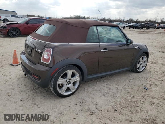 2011 MINI Convertible S with VIN WMWZP3C58BTX83725, listed as a Copart auction lot 44418965 with 45,401 mi miles and Salvage title. Bid and sale history available at DreamBid. Image 3.