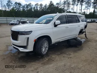 2021 Cadillac Escalade Premium Luxury z VIN 1GYS4CKL4MR240864, wystawiony jako Copart lot #54990944 z przebiegiem 74 712 mil mil oraz Szkody całkowita. Historia ofert i sprzedaży dostępna na DreamBid. Obrazek 1.