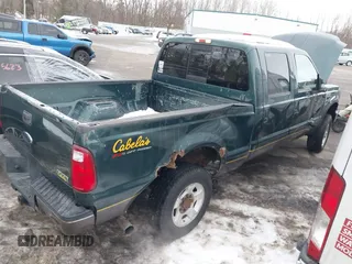 2010 Ford Super Duty F-250 SRW XL with VIN 1FTSW2B50AEA06431, listed as a IAAI auction lot 41406607 with 229,665 mi miles. Bid and sale history available at carsss.com. Image 4.