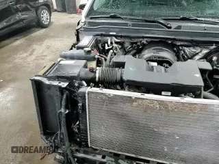 2018 Cadillac Escalade Luxury with VIN 1GYS4BKJ5JR260318, listed as a Copart auction lot 58726495 with 77,008 mi miles and Salvage title. Bid and sale history available at DreamBid. Image 16.