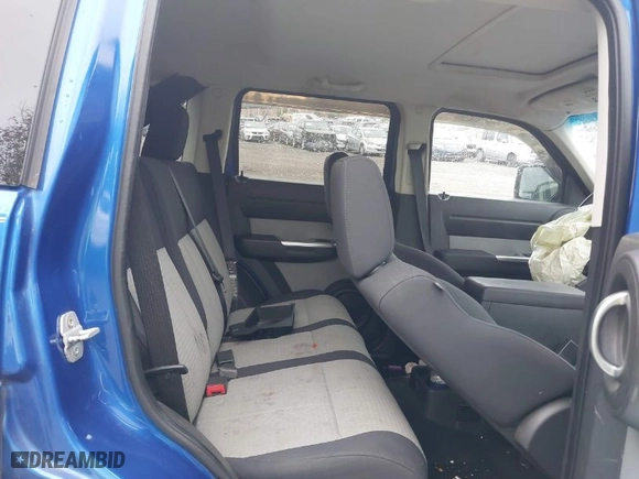 2007 Dodge Nitro SLT with VIN 1D8GU58K97W560212, listed as a IAAI auction lot 41018041 with 1 mi miles. Bid and sale history available at carsss.com. Image 8.