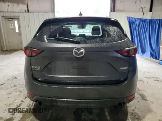 2018 Mazda CX-5 Grand Touring with VIN JM3KFBDM1J0440849, listed as a Copart auction lot 58354655 with 43,348 mi miles and Salvage title. Bid and sale history available at DreamBid. Image 6.