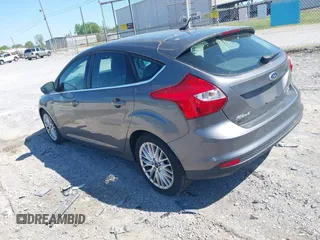 2012 Ford Focus SEL with VIN 1FAHP3M27CL399204, listed as a IAAI auction lot 41980976 with 113,443 mi miles. Bid and sale history available at carsss.com. Image 3.