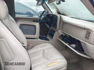 2003 Chevrolet Tahoe LS z VIN 1GNEC13Z73J164865, wystawiony jako IAAI lot #42213688 z przebiegiem Nie podano mil oraz . Historia ofert i sprzedaży dostępna na DreamBid. Obrazek 5.