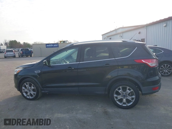 2015 Ford Escape Titanium with VIN 1FMCU0J98FUA19911, listed as a IAAI auction lot 41750596 with 106,706 mi miles. Bid and sale history available at carsss.com. Image 14.