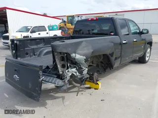 2014 Chevrolet Silverado 1500 LT with VIN 1GCRCREC4EZ299906, listed as a IAAI auction lot 41988540 with 86,975 mi miles. Bid and sale history available at carsss.com. Image 4.