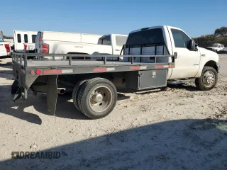 2001 Ford F-450 XL with VIN 1FDXF46F11EA30091, listed as a Copart auction lot 77682024 with 155,351 mi miles and Salvage Title. Bid and sale history available at carsss.com. Image 3.