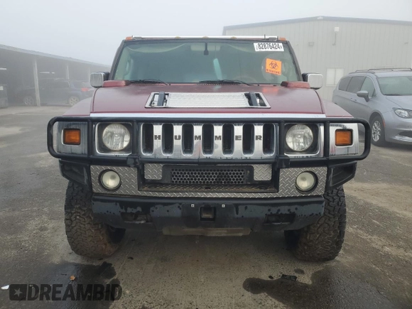 2003 Hummer H2 with VIN 5GRGN23UX3H147490, listed as a Copart auction lot 82876424 with 241,737 mi miles and Clean Title. Bid and sale history available at carsss.com. Image 5.