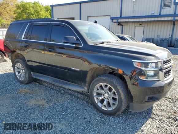 2015 Chevrolet Tahoe LT with VIN 1GNSCBKC0FR521749, listed as a Copart auction lot 50480075 with 156,940 mi miles and Salvage Title. Bid and sale history available at DreamBid. Image 4.