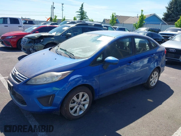 2011 Ford Fiesta SE with VIN 3FADP4BJ6BM145768, listed as a IAAI auction lot 42192387 with 159,825 mi miles and . Bid and sale history available at carsss.com. Image 2.