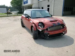 2013 MINI Hardtop S with VIN WMWSV3C52DT396176, listed as a Copart auction lot 59207165 with 104,194 mi miles and Salvage title. Bid and sale history available at DreamBid. Image 13.