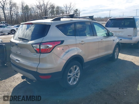 2017 Ford Escape SE with VIN 1FMCU0GDXHUD65232, listed as a IAAI auction lot 41721026 with 79,582 mi miles. Bid and sale history available at carsss.com. Image 4.