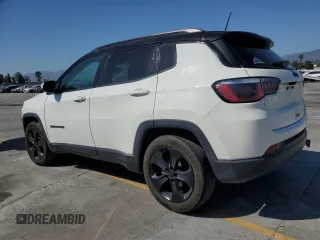 2019 Jeep Compass Altitude with VIN 3C4NJCBB4KT833213, listed as a Copart auction lot 57519955 with 82,738 mi miles and Salvage title. Bid and sale history available at DreamBid. Image 2.