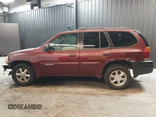 2002 GMC Envoy SLT with VIN 1GKDT13SX22426320, listed as a IAAI auction lot 41709359 with 104,418 mi miles. Bid and sale history available at carsss.com. Image 14.
