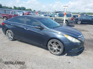 2012 Hyundai Sonata SE z VIN 5NPEC4AC4CH323178, wystawiony jako IAAI lot #42386066 z przebiegiem 168 949 mil mil oraz . Historia ofert i sprzedaży dostępna na DreamBid. Obrazek 1.