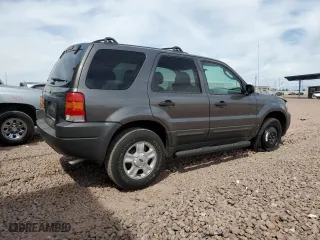 2003 Ford Escape XLT Popular with VIN 1FMYU03103KC43310, listed as a Copart auction lot 50362285 with 69,308 mi miles and Salvage Title. Bid and sale history available at carsss.com. Image 3.