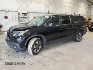 2017 Honda Ridgeline RTL with VIN 5FPYK3F55HB035820, listed as a Copart auction lot 65274985 with 99,757 mi miles and Non repairable. Bid and sale history available at DreamBid. Image 1.