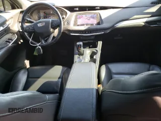 2019 Cadillac XT4 AWD Premium Luxury с VIN 1GYFZDR4XKF170289, выставлен на аукционе Copart как лот 75809964 с пробегом 100 524 миль миль и Списание • Salvage title. История ставок и продаж доступна на DreamBid. Изображение 8.