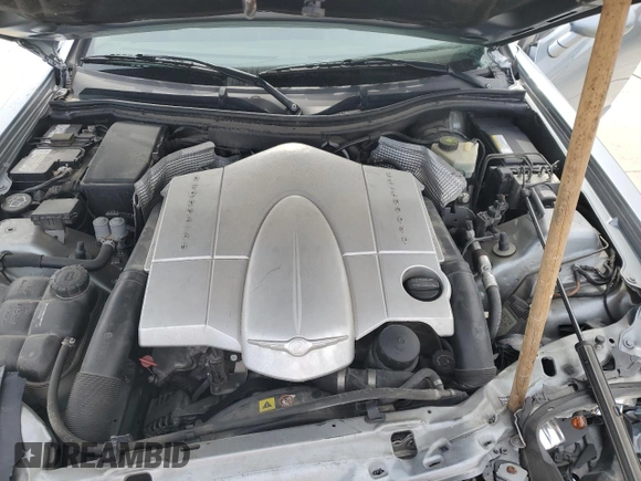 2004 Chrysler Crossfire z VIN 1C3AN69L14X024234, wystawiony jako Copart lot #51322415 z przebiegiem 70 243 mil mil oraz Szkoda całkowita • Salvage title. Historia ofert i sprzedaży dostępna na DreamBid. Obrazek 11.