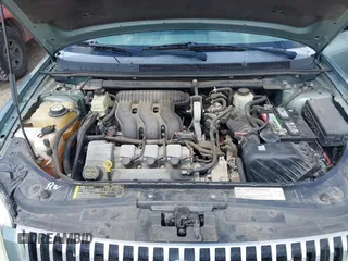 2006 Mercury Montego Luxury z VIN 1MEFM40106G609778, wystawiony jako IAAI lot #42212020 z przebiegiem Nie podano mil oraz . Historia ofert i sprzedaży dostępna na DreamBid. Obrazek 10.