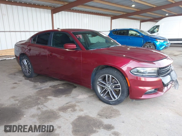 2019 Dodge Charger SXT with VIN 2C3CDXJG0KH757909, listed as a IAAI auction lot 41597907 with 71,882 mi miles and . Bid and sale history available at DreamBid. Image 1.