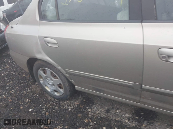 2001 Hyundai Elantra GLS z VIN KMHDN45D71U080537, wystawiony jako IAAI lot #42095959 z przebiegiem Nie podano mil oraz . Historia ofert i sprzedaży dostępna na DreamBid. Obrazek 6.