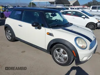 2010 MINI Hardtop with VIN WMWMF3C59ATZ66563, listed as a IAAI auction lot 42098521 with 153,734 mi miles and . Bid and sale history available at DreamBid. Image 1.