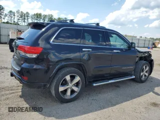 2016 Jeep Grand Cherokee Overland with VIN 1C4RJFCM9GC302353, listed as a Copart auction lot 58789604 with 87,826 mi miles and Clean title. Bid and sale history available at DreamBid. Image 3.