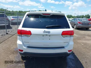 2014 Jeep Grand Cherokee Limited with VIN 1C4RJFBG3EC350648, listed as a IAAI auction lot 42523221 with 125,447 mi miles and . Bid and sale history available at DreamBid. Image 17.