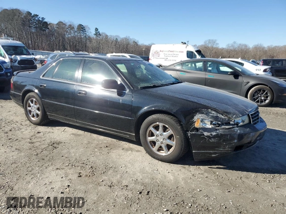 2000 Cadillac Seville Touring STS z VIN 1G6KY5495YU177352, wystawiony jako Copart lot #86020444 z przebiegiem Nie podano mil oraz Szkoda całkowita • Salvage title. Historia ofert i sprzedaży dostępna na DreamBid. Obrazek 4.