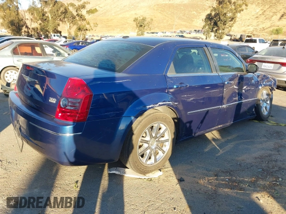 2009 Chrysler 300 Touring with VIN 2C3LA53V89H565270, listed as a IAAI auction lot 41069505 with 112,830 mi miles. Bid and sale history available at carsss.com. Image 4.