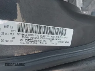 2019 Dodge Grand Caravan SXT with VIN 2C4RDGCG1KR514123, listed as a IAAI auction lot 41777811 with 119,087 mi miles and . Bid and sale history available at DreamBid. Image 9.