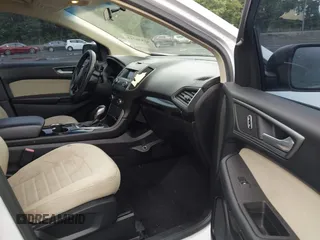 2015 Ford Edge SE z VIN 2FMTK4G87FBC18076, wystawiony jako IAAI lot #42536718 z przebiegiem 180 790 mil mil oraz . Historia ofert i sprzedaży dostępna na DreamBid. Obrazek 5.
