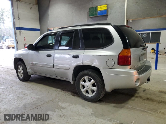 2005 GMC Envoy SLT with VIN 1GKDT13S652197929, listed as a Copart auction lot 42104855 with 228,515 mi miles and Salvage Title. Bid and sale history available at carsss.com. Image 2.