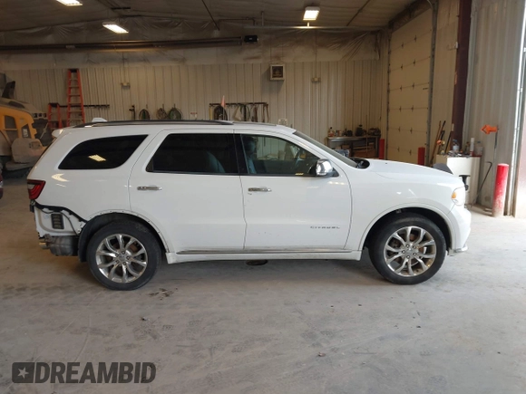 2016 Dodge Durango Citadel with VIN 1C4RDJEG9GC371805, listed as a IAAI auction lot 42135988 with 122,924 mi miles and . Bid and sale history available at DreamBid. Image 13.