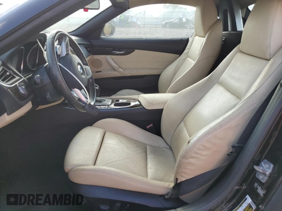 2011 BMW Z4 sDrive30i with VIN WBALM5C54BE378752, listed as a Copart auction lot 58517654 with 86,596 mi miles and Clean Title. Bid and sale history available at carsss.com. Image 7.