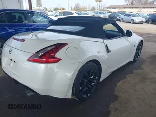 2019 Nissan 370Z Touring with VIN JN1AZ4FH2KM620085, listed as a IAAI auction lot 41533662 with 57,580 mi miles and . Bid and sale history available at DreamBid. Image 4.