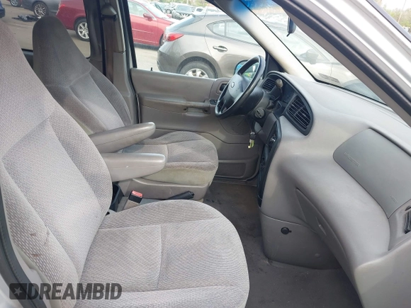 2003 Ford Windstar with VIN 2FMZA50463BB64937, listed as a IAAI auction lot 42083205 with 141,212 mi miles and . Bid and sale history available at DreamBid. Image 5.