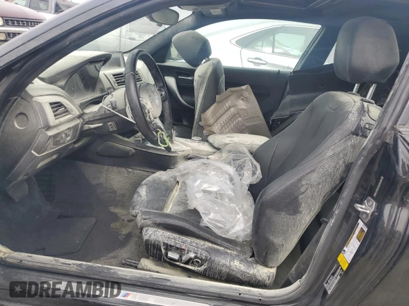 2016 BMW 2 Series 228i with VIN WBA1F9C57GV544925, listed as a Copart auction lot 44940625 with 54,982 mi miles and Salvage Title. Bid and sale history available at DreamBid. Image 7.