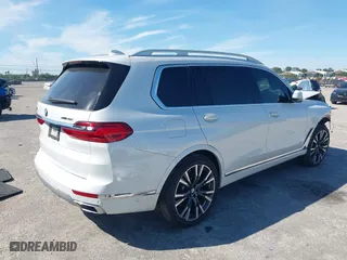 2020 BMW X7 xDrive40i with VIN 5UXCW2C00L9A03002, listed as a IAAI auction lot 41856130 with 33,713 mi miles. Bid and sale history available at carsss.com. Image 4.