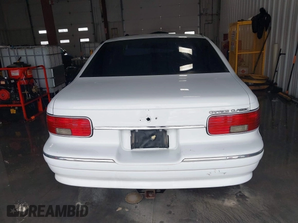 1996 Chevrolet Caprice 1SA Special Value z VIN 1G1BL52P3TR165928, wystawiony jako IAAI lot #41271004 z przebiegiem 130 794 mil mil oraz . Historia ofert i sprzedaży dostępna na DreamBid. Obrazek 16.