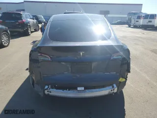 2021 Tesla Model Y Long Range with VIN 5YJYGAEE4MF160057, listed as a Copart auction lot 46144895 with 47,005 mi miles and Salvage Title. Bid and sale history available at carsss.com. Image 6.