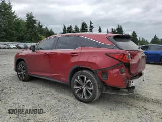 2018 Lexus RX 450hL Premium with VIN JTJDGKCA5J2002701, listed as a Copart auction lot 60258935 with 73,437 mi miles and Salvage title. Bid and sale history available at DreamBid. Image 2.
