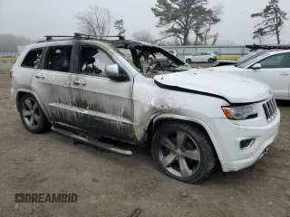 2015 Jeep Grand Cherokee Overland with VIN 1C4RJFCG8FC174325, listed as a Copart auction lot 51074475 with Not Provided miles and Salvage Title. Bid and sale history available at carsss.com. Image 4.