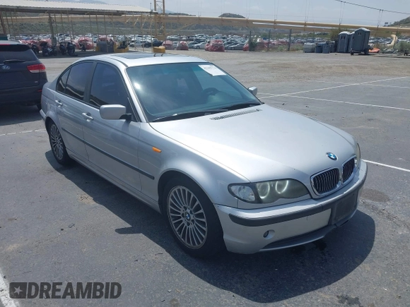 2002 BMW 3 Series 325i with VIN WBAET37452NG73105, listed as a IAAI auction lot 42105774 with 202,852 mi miles. Bid and sale history available at carsss.com. Image 1.